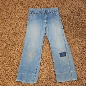 Vintage LEVI'S Light Blue Denim Jeans with Patch Holes Wear Rips 70S Retro
